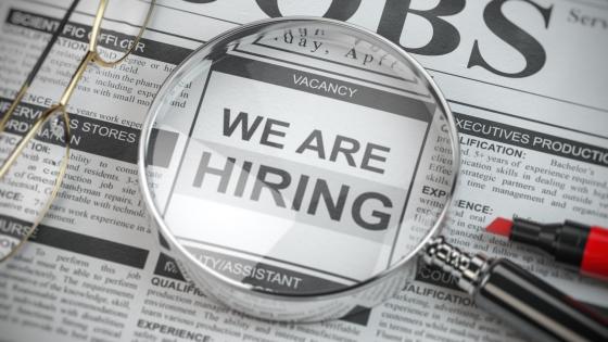 "We are hiring" advert in newspaper 