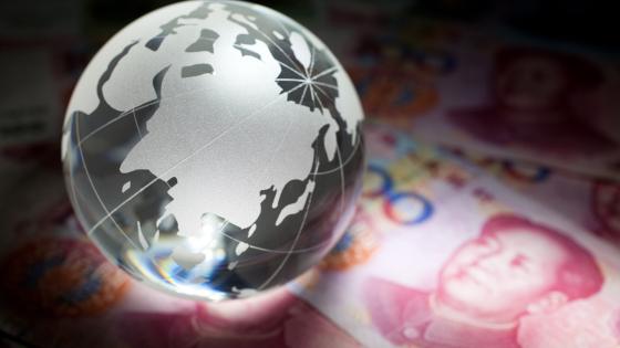 Globe and Chinese currency