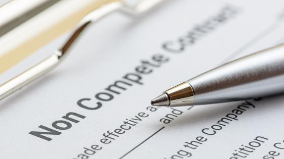 pen on a non compete contract