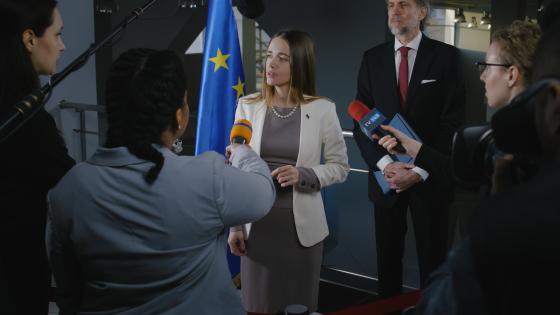 Female politician answers journalists question